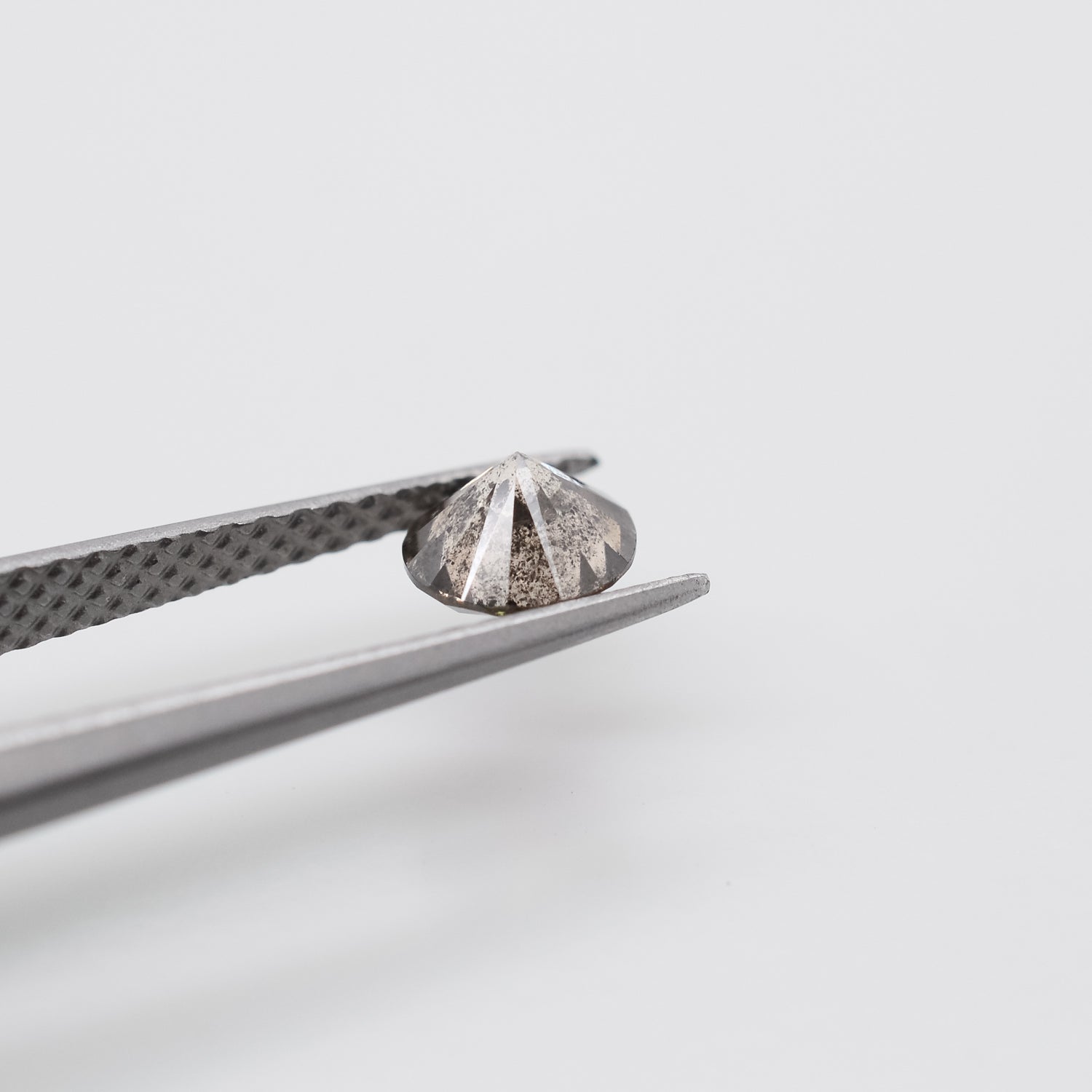 0.55ct Round Brilliant Cut Loose Salt & Pepper Diamond - Malleable Jewellers