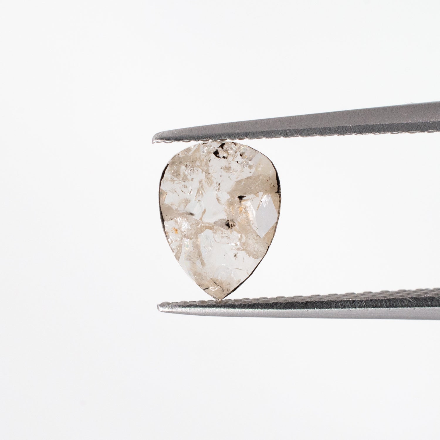 0.61ct Pear Shaped Loose Salt & Pepper Diamond - Malleable Jewellers
