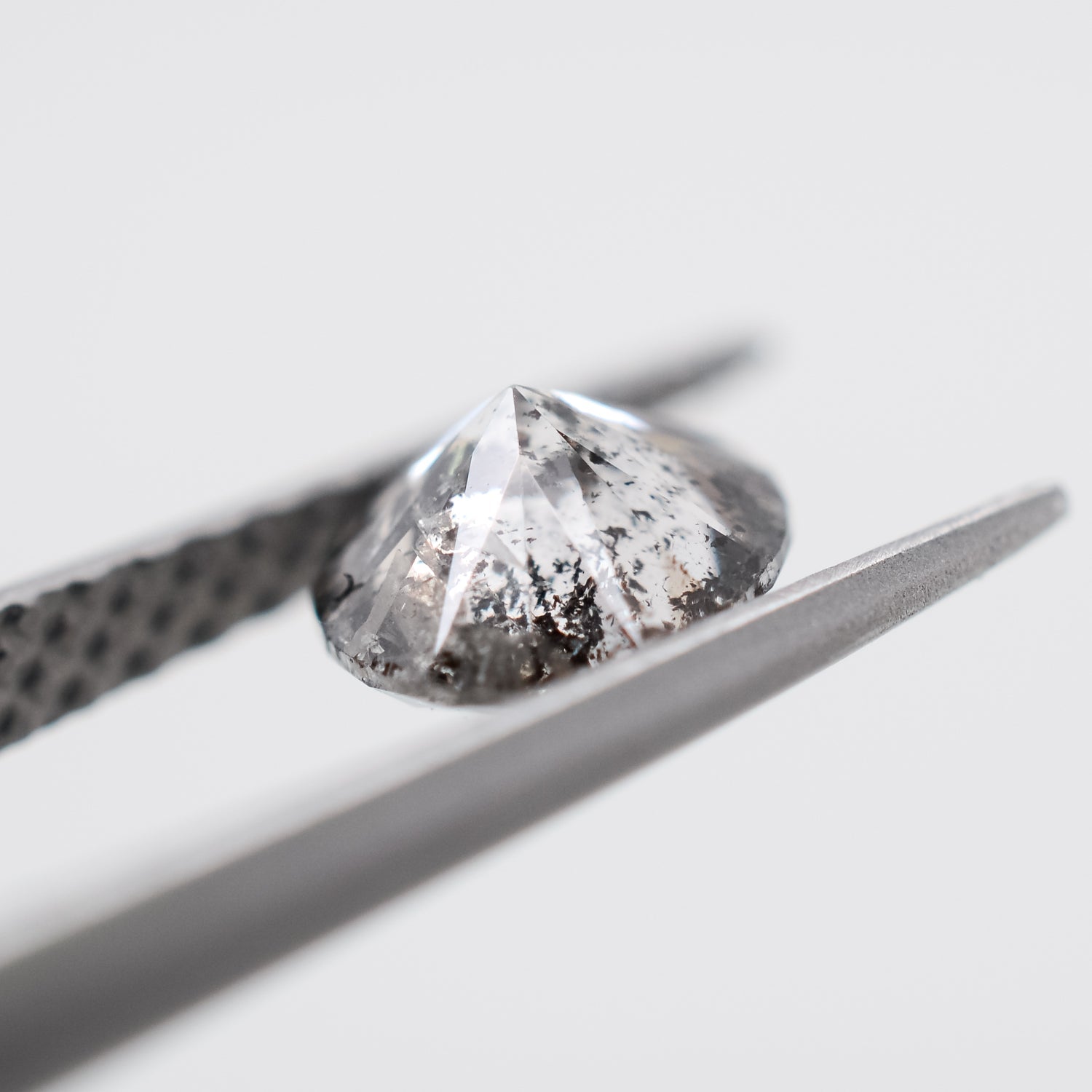 0.66ct Round Brilliant Cut Loose Salt & Pepper Diamond - Malleable Jewellers