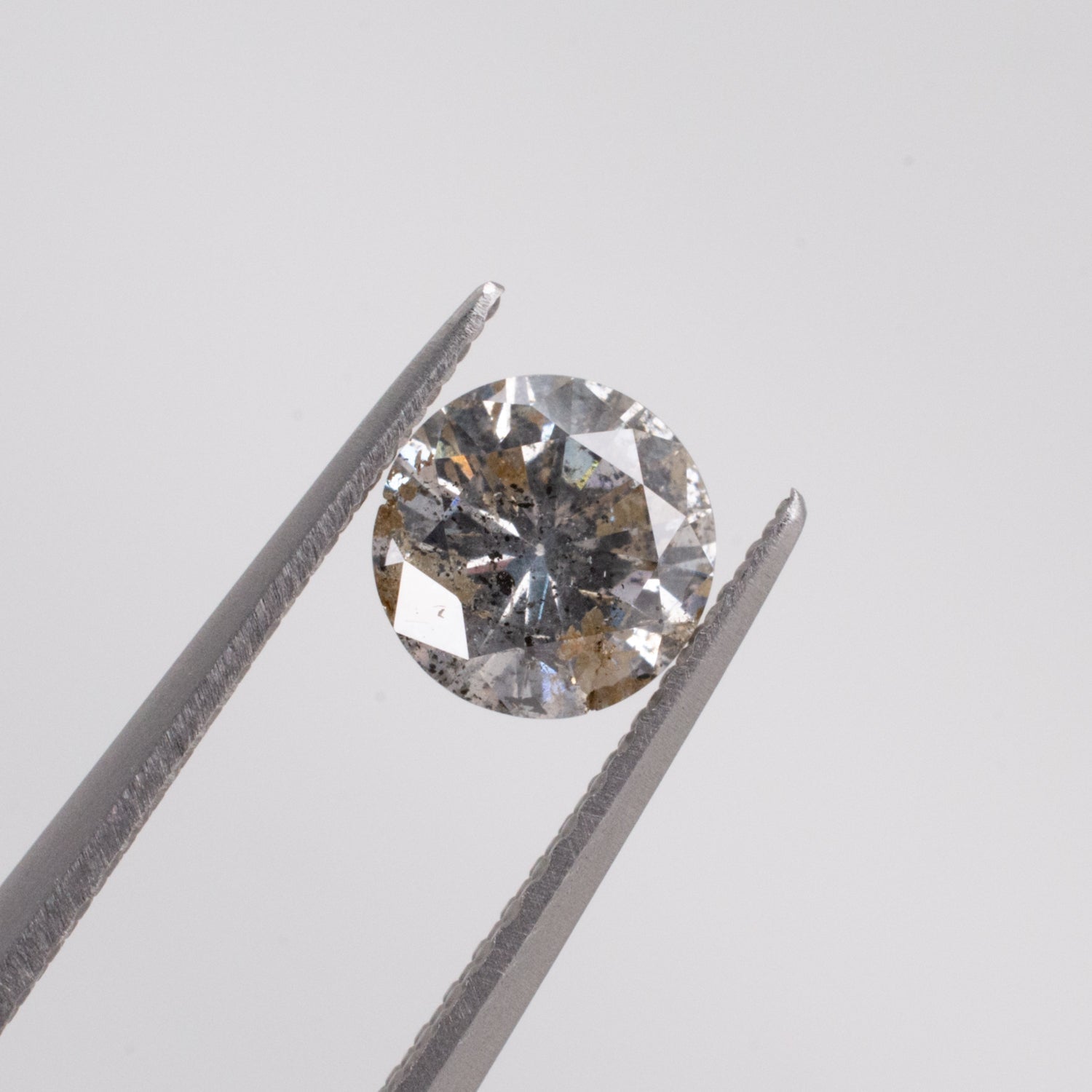 0.67ct Round Brilliant Cut Loose Salt & Pepper Diamond - Malleable Jewellers