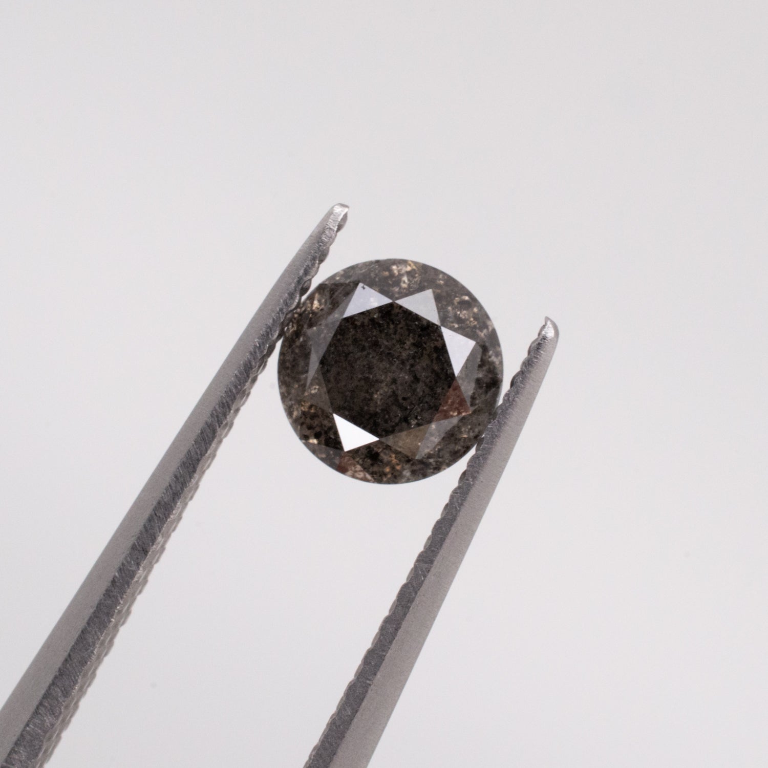 0.67ct Round Brilliant Cut Loose Salt & Pepper Diamond - Malleable Jewellers