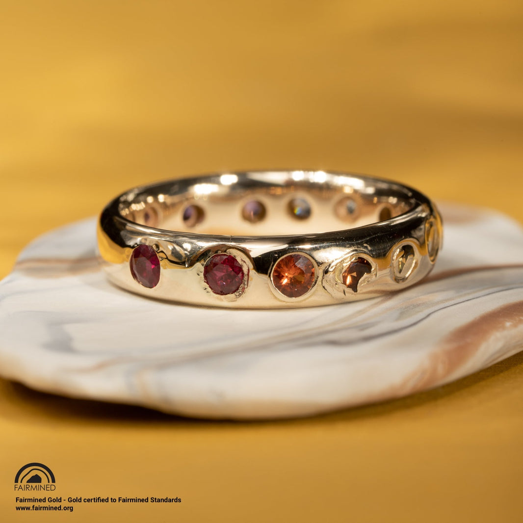 Malleable's rainbow Kimberlite gold ring with multiple stones