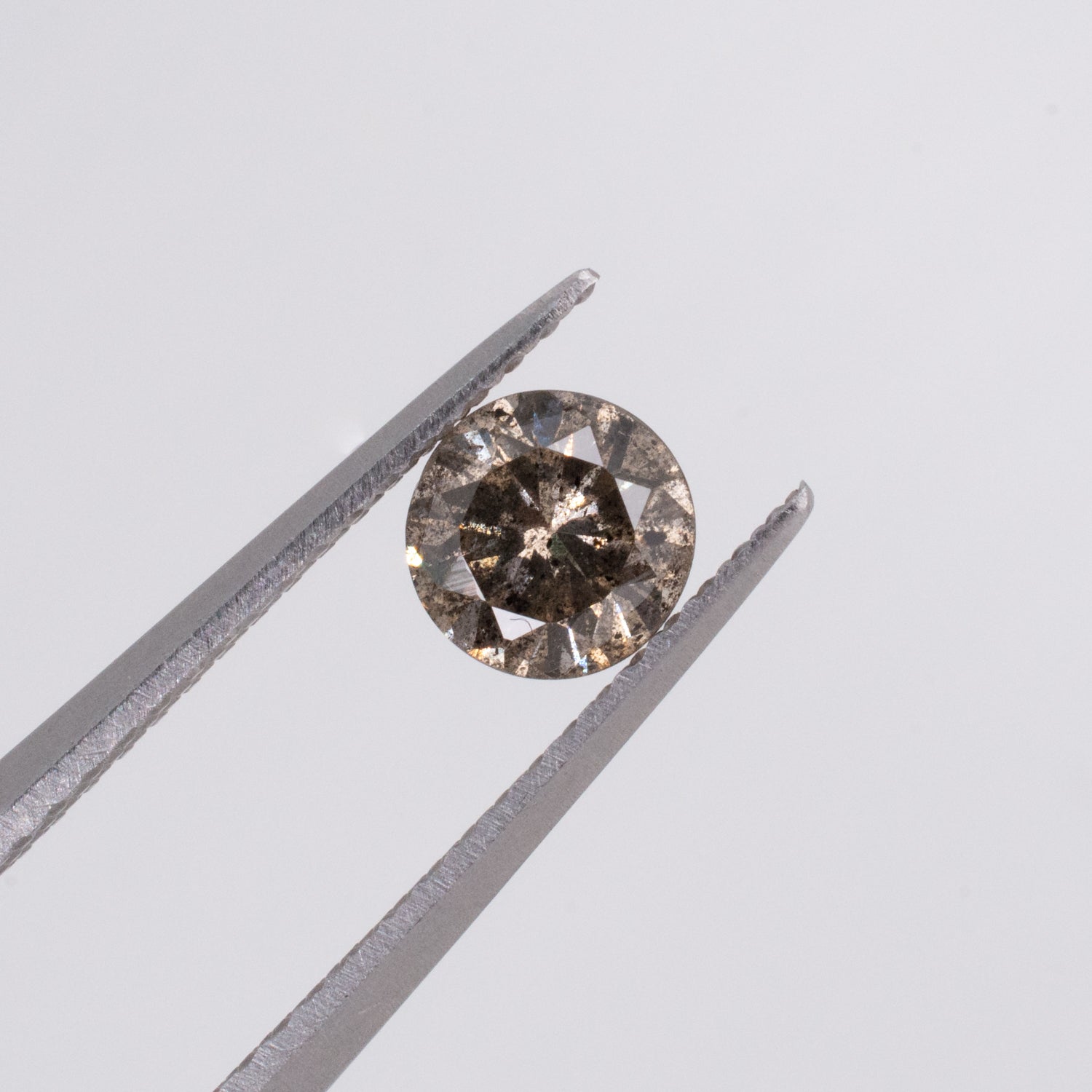 0.55ct Round Brilliant Cut Loose Salt & Pepper Diamond - Malleable Jewellers