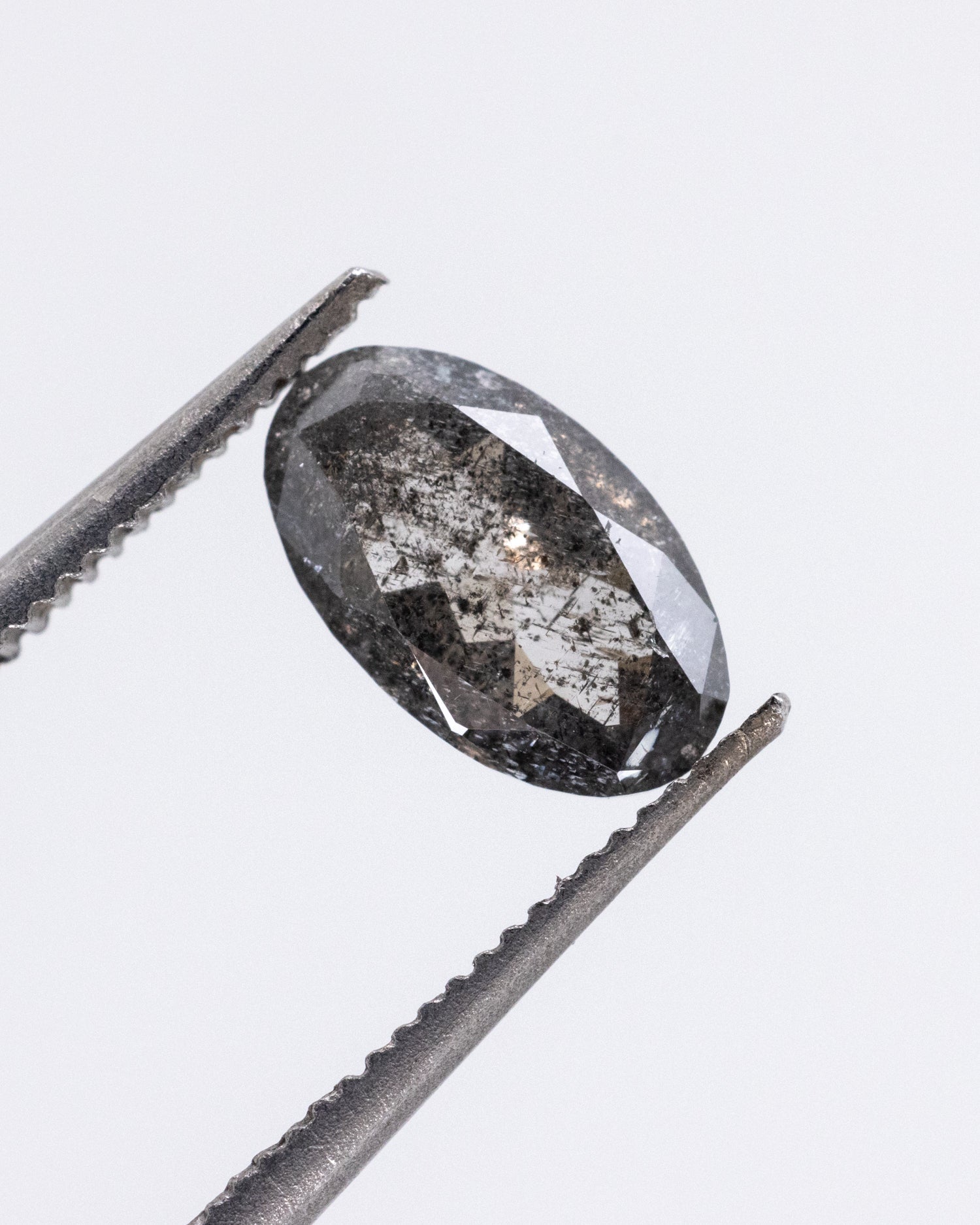 0.58ct Oval Shaped Loose Salt & Pepper Diamond - Malleable Jewellers