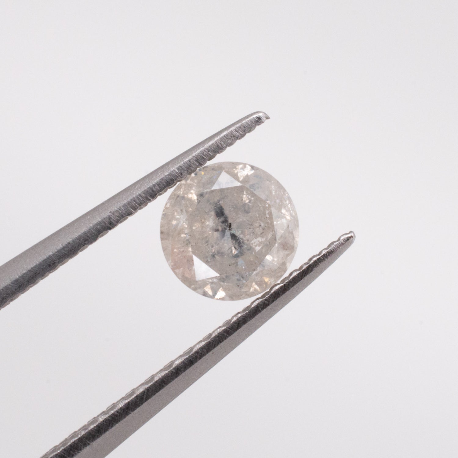 0.59ct Round Brilliant Cut Loose Salt & Pepper Diamond - Malleable Jewellers