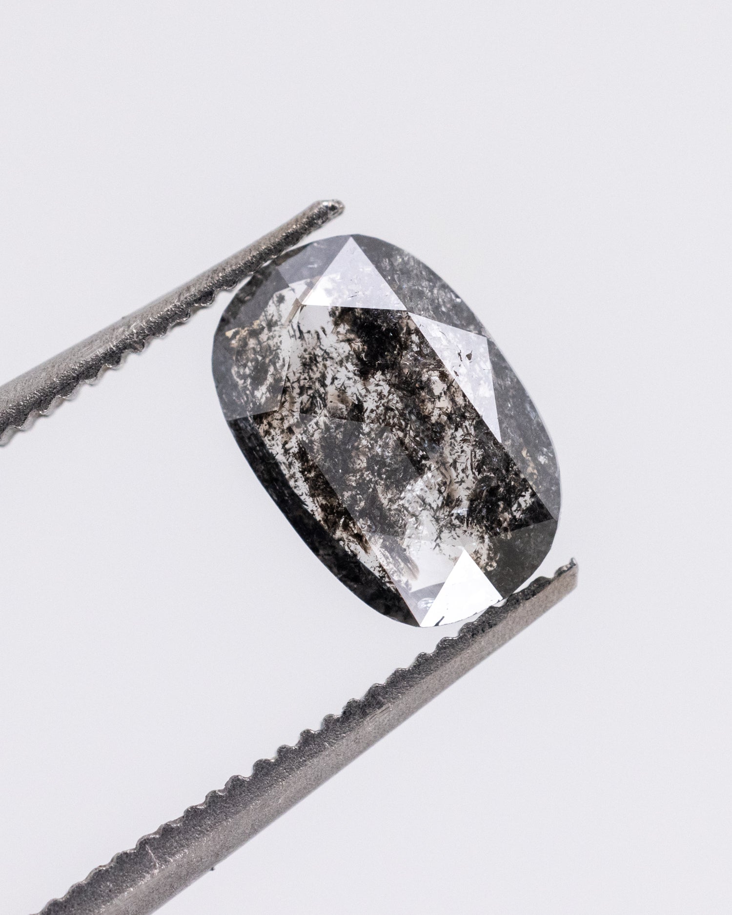 0.61ct Oval Shaped Loose Salt & Pepper Diamond - Malleable Jewellers