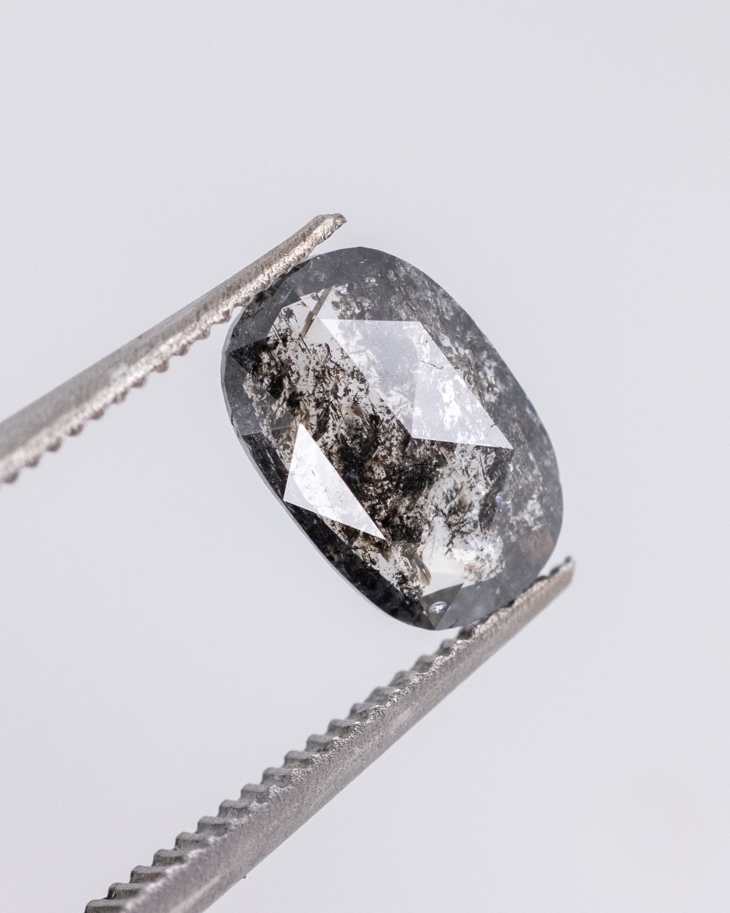 0.61ct Oval Shaped Loose Salt & Pepper Diamond