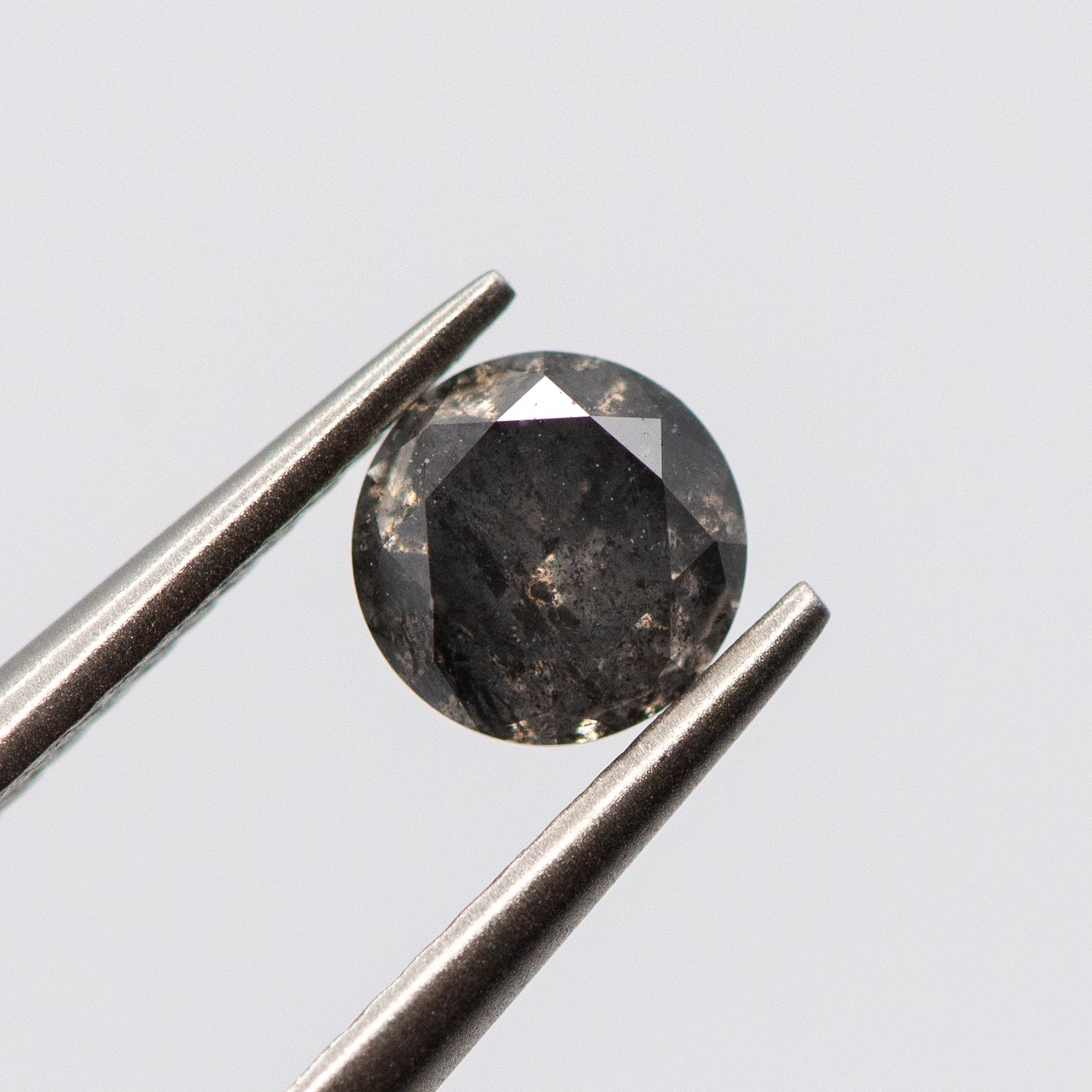 0.52ct Round Shaped Dark Grey Loose Salt & Pepper Diamond Malleable Jewellers