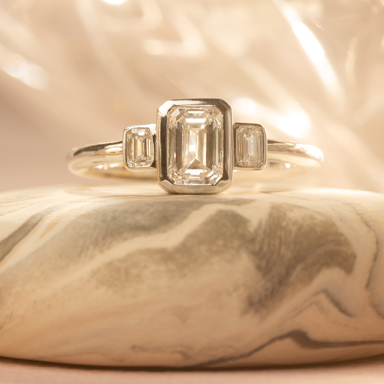 Emerald Cut Trio Ring in White Gold - Malleable Jewellers