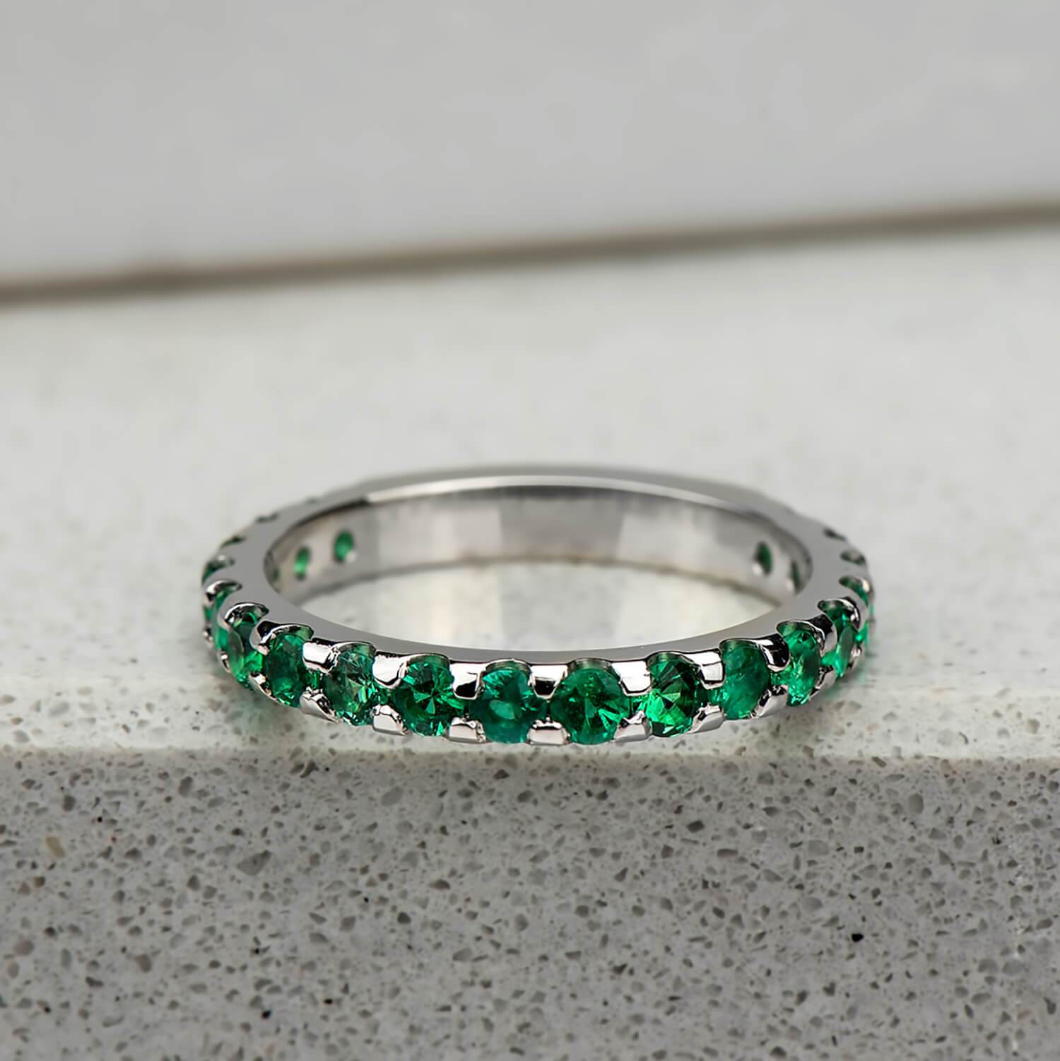 Emerald Three Quarter Eternity Band in White Gold