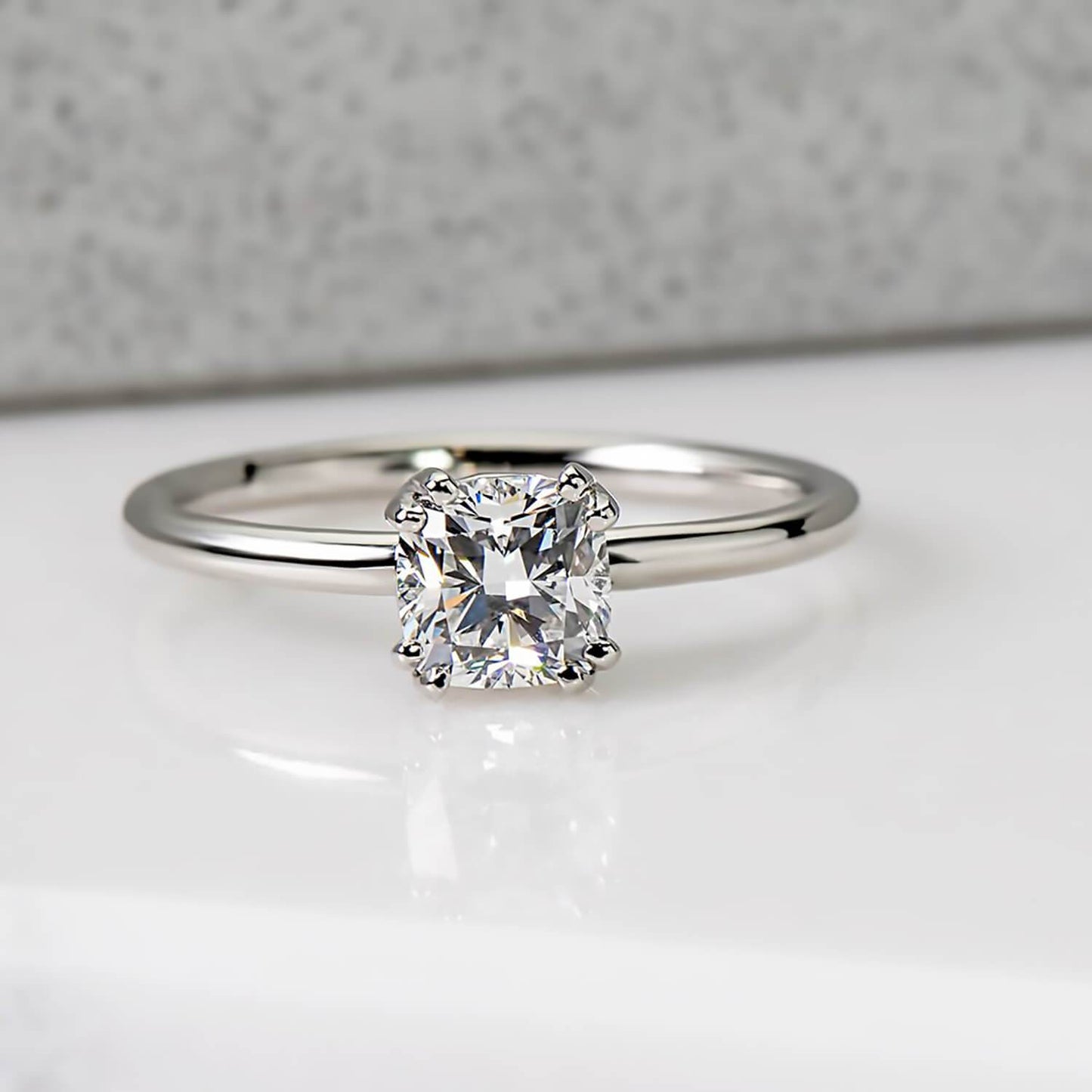 Cushion Cut Solitaire in White Gold