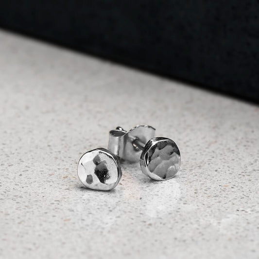 Sterling silver circular hammer finished studs brought to a high polish, approximately 4.2mm in diameter 