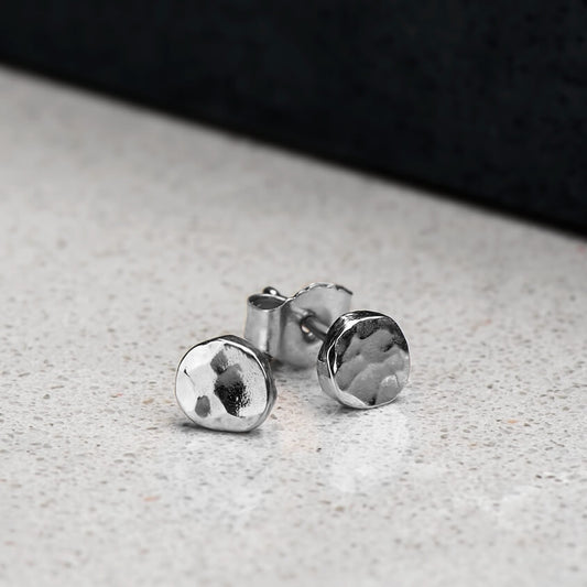 Hammer Finished Studs In White Gold