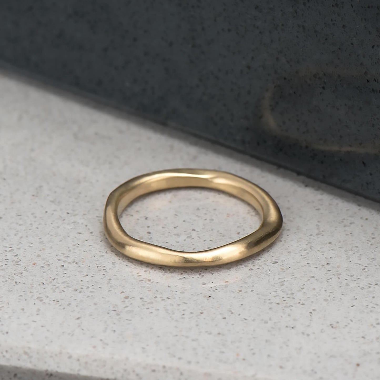 Organic, irregular shaped ring in 10 karat recycled yellow gold with a satin finish.