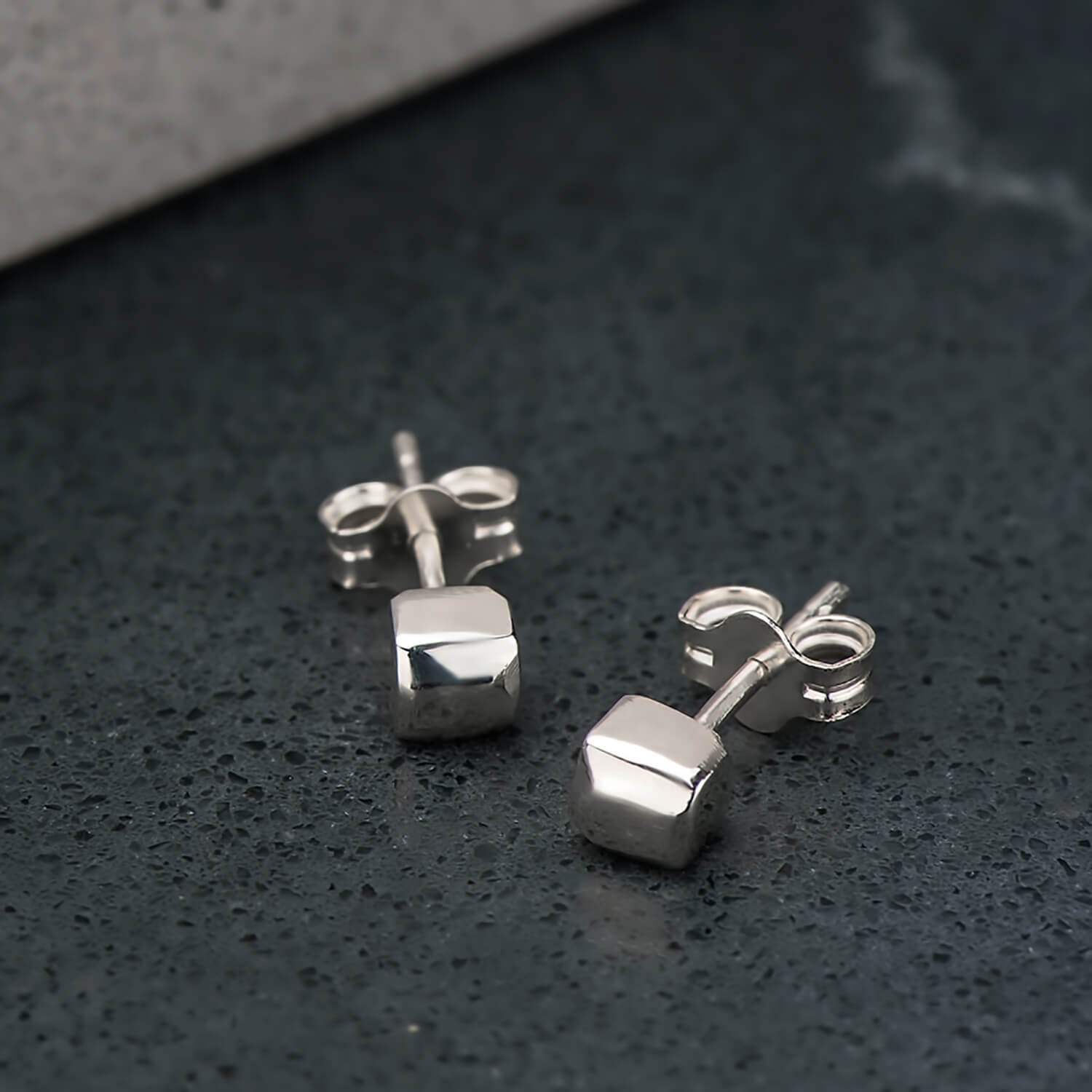 Recycled sterling silver tetragonal studs, they are cubic shaped and brought to a mirror polished finish.