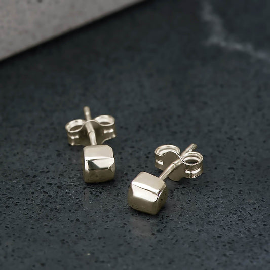 Recycled 10 karat yellow gold tetragonal studs, they are cubic shaped and brought to a mirror polished finish.